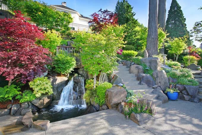 Landscaped garden with a stone waterfall